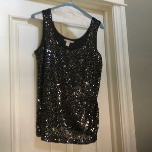 Great fun top.  Sequins on front